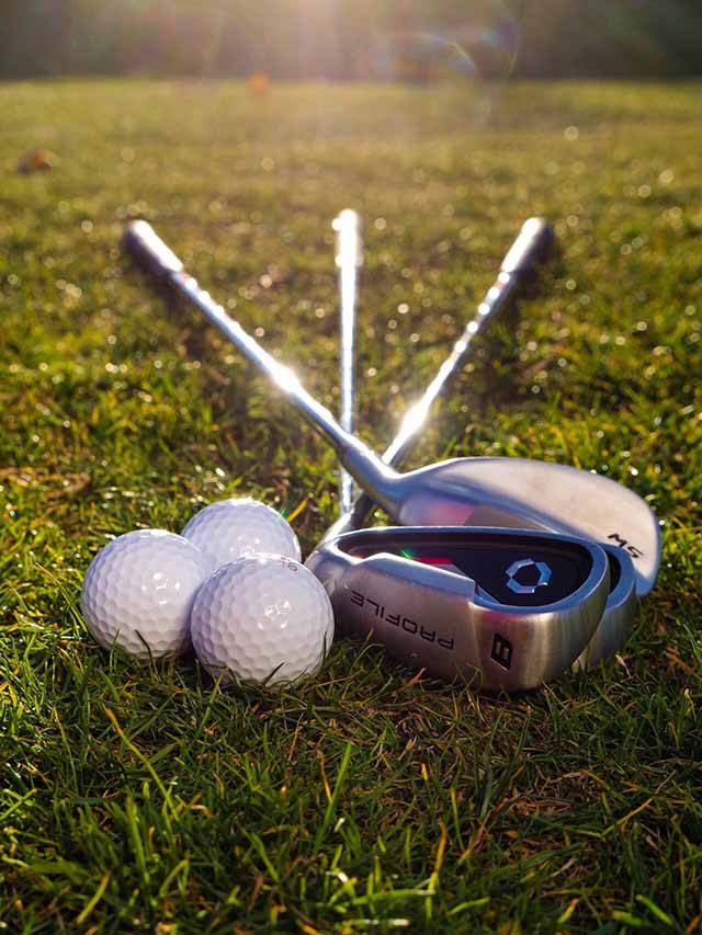 golf balls and clubs