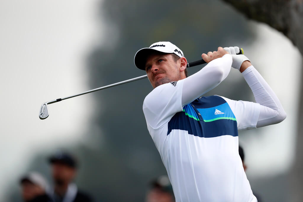 justin Rose swinging golf club